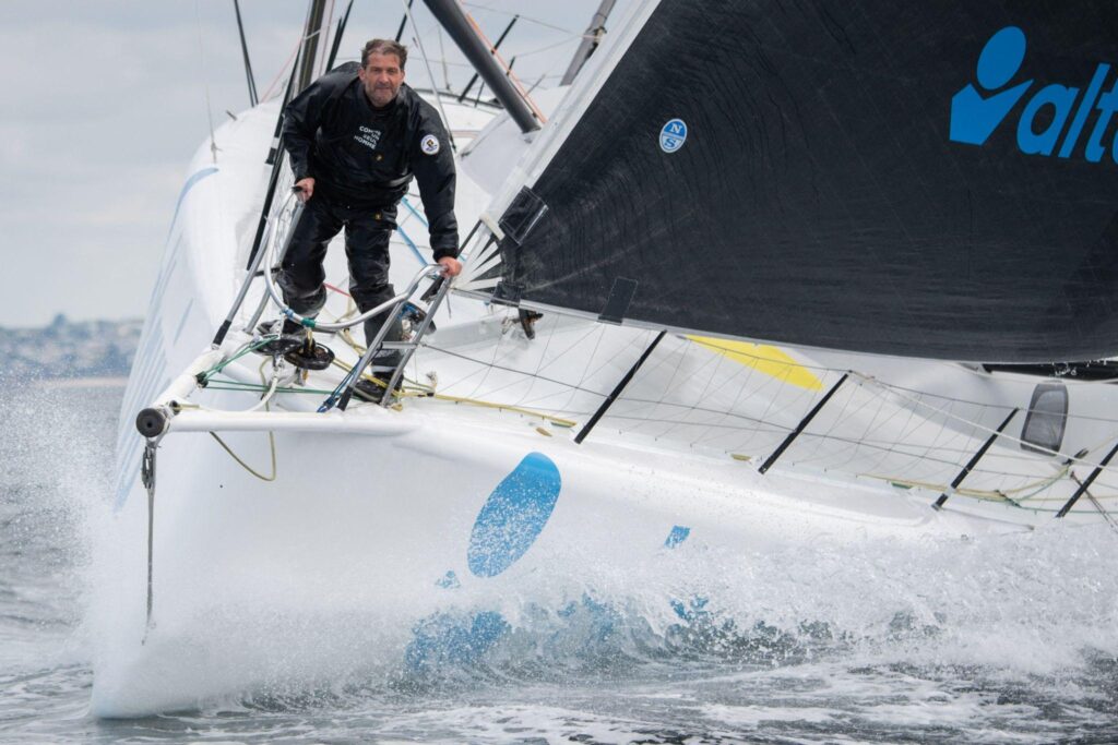A racing sailboat yacht in full action. 
