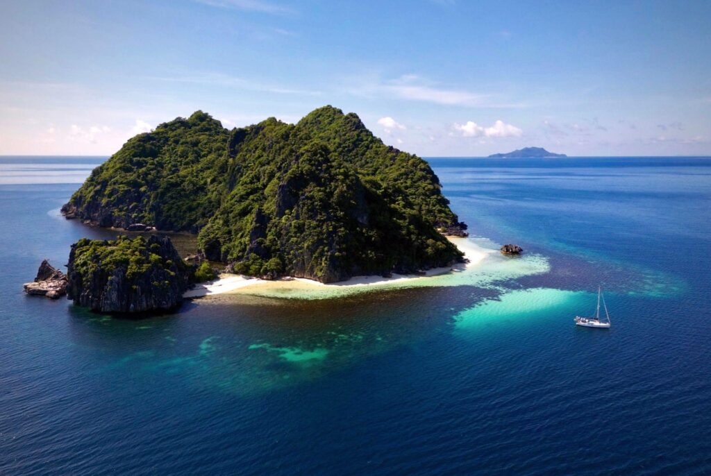 Sailboat anchored in a stunning bay in Asia. 